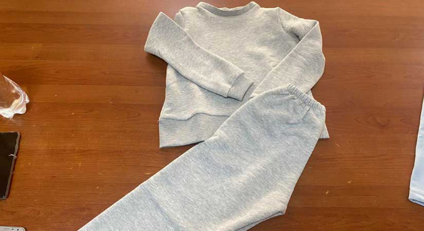 100 adet eşofman takımı diktiler