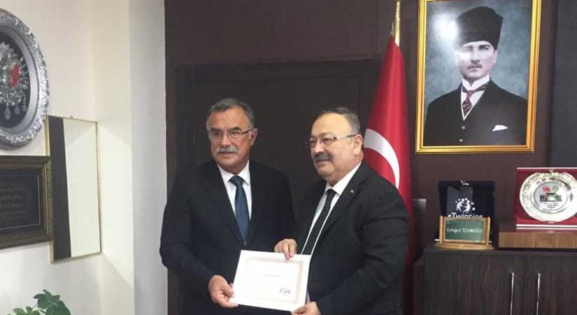 Mehmet Karaman’a hizmet şeref belgesi