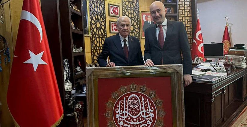 Enver Yücel Bahçeli ziyaretinde tablo mesajı